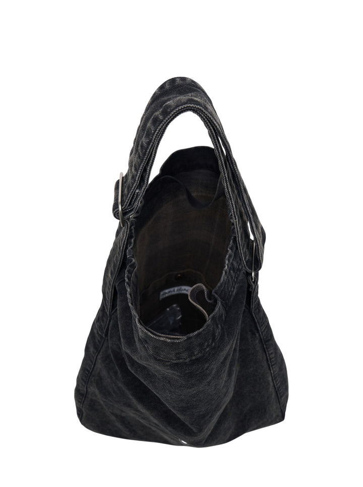 Our Legacy washed black denim sling crossbody bag with adjustable strap and drawstring top closure, rear view - view 3