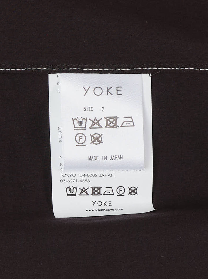YOKE black long sleeve shirt with white contrast topstitching, camp collar, front button placket and patch chest pocket - view 3