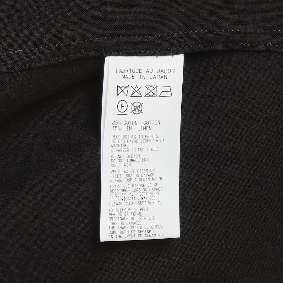 Yohji Yamamoto Spare Collar Long Sleeve Shirt in black, oversized fit with dual buttoned chest pockets and tonal button-through placket, front view on white background - view 3