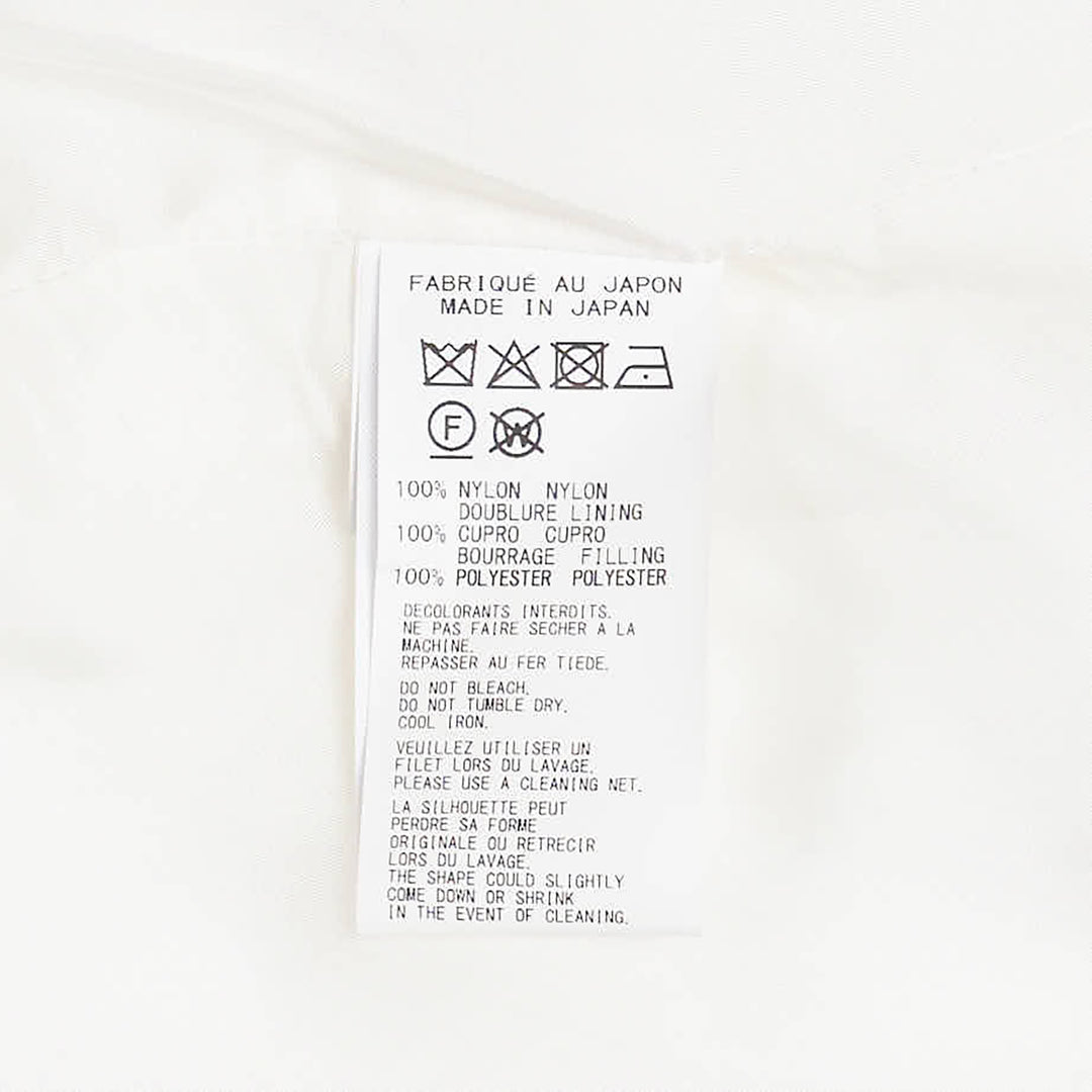 Yohji Yamamoto Padded Triple Collar Blouse in off-white, featuring layered fanned collar leaves, tonal button-front placket, and dual angular chest pocket flaps - view 3