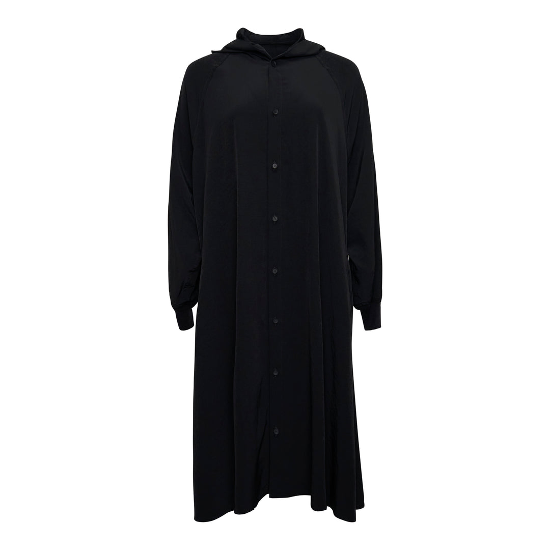 Yohji Yamamoto black hooded raglan sleeve midi dress with button-front fastening and fluid A-line silhouette, photographed flat on white background