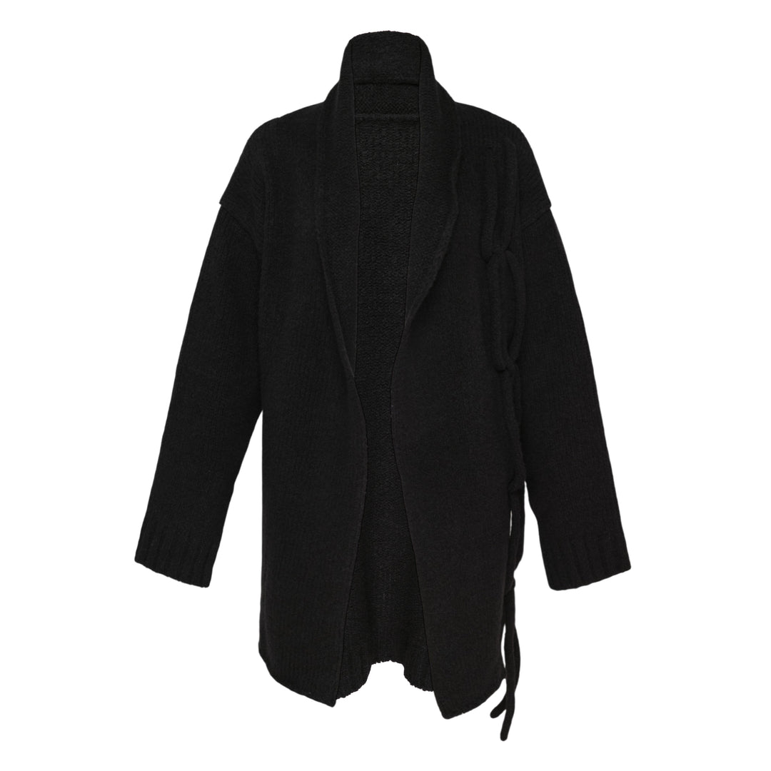 Yohji Yamamoto String Detail Cardigan in black — oversized open-front knit with tie-string hem detail and ribbed cuffs, displayed on a mannequin