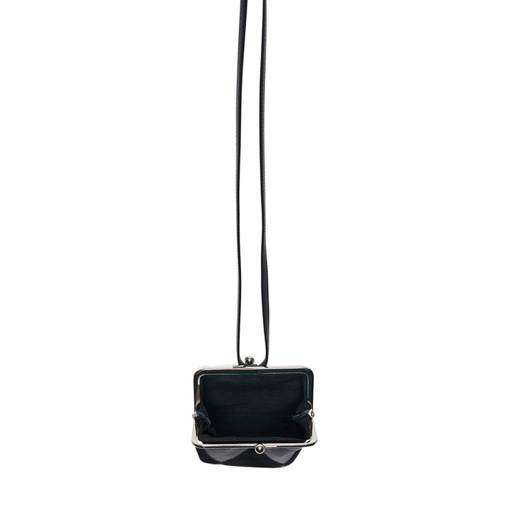 Y's black tonal argyle leather and suede patchwork mini pouch with silver-tone kiss-lock clasp, suspended from a long slender leather necklace cord against a white background
