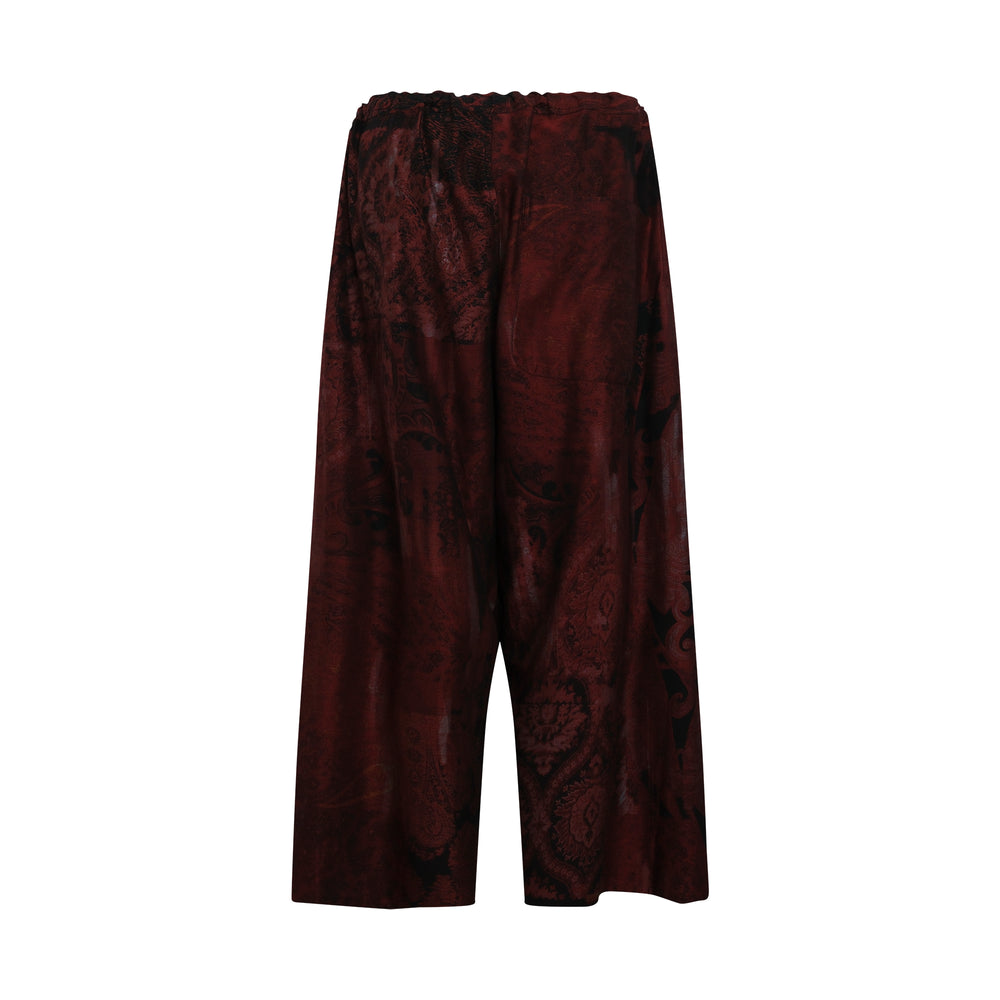 Y's front tuck wide pants in burgundy and black baroque jacquard, featuring deep front pleats, a high-rise waistband with button fastening, and a cropped wide-leg silhouette - view 2