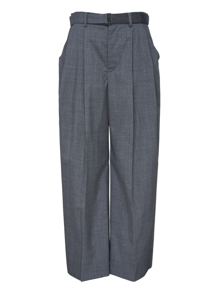 sacai wide-leg belted suiting pants in grey, featuring deep front pleats, integrated belt with metal buckle, and a structured wide-leg silhouette