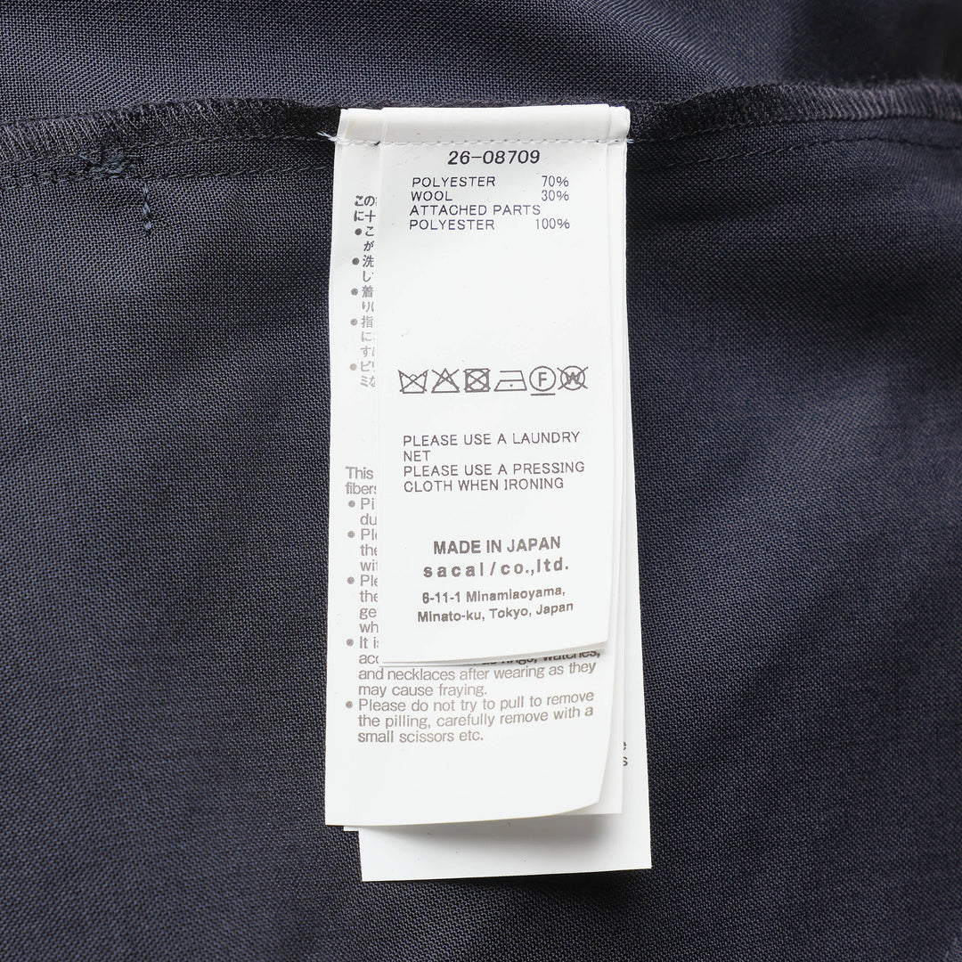 sacai Suiting x Crepe Back Satin Shirt in khaki and navy, featuring four flap cargo pockets, stand collar, and contrast long sleeves in a relaxed oversized silhouette - view 3