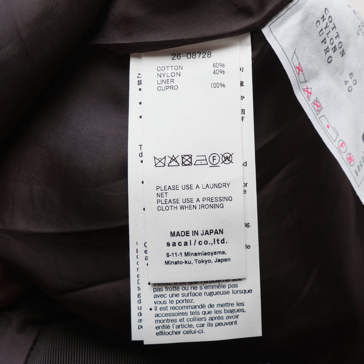 sacai Grosgrain Belted Wide-Leg Pants in black — high-waist pleated culottes with cargo patch pockets and integrated grosgrain belt, front view - view 3