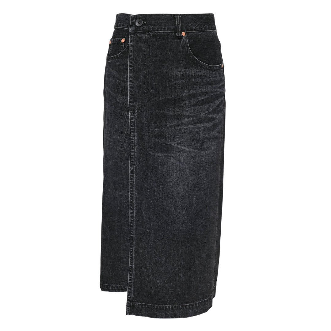 sacai washed black midi denim skirt with high waist, vertical front seam, five-pocket construction, copper rivets, and asymmetric hem slit