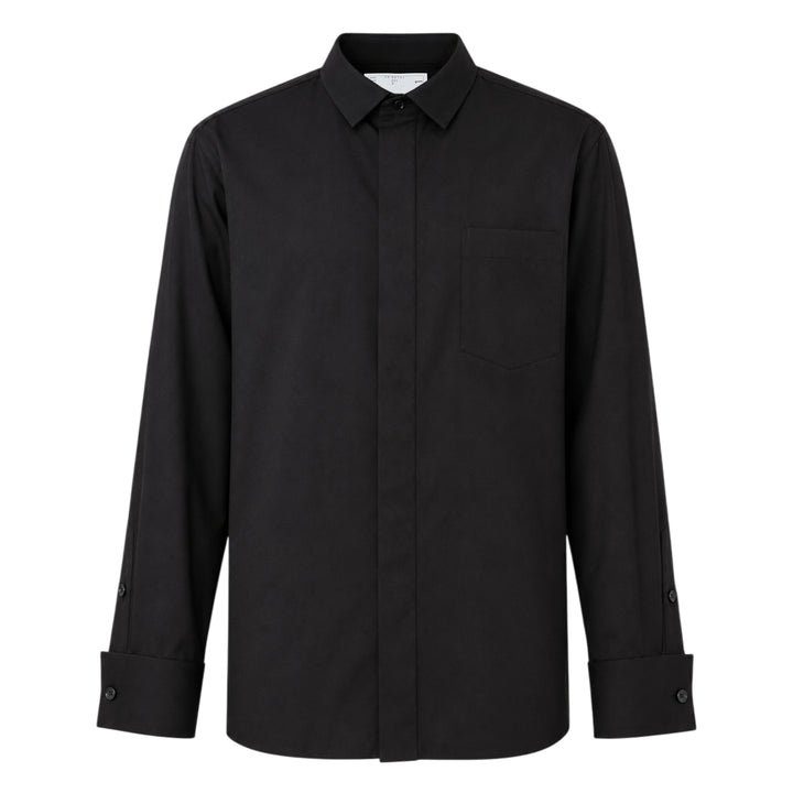 sacai black poplin long sleeve shirt with concealed front placket, point collar, chest pocket, and button-fastened cuffs, shown flat on white background