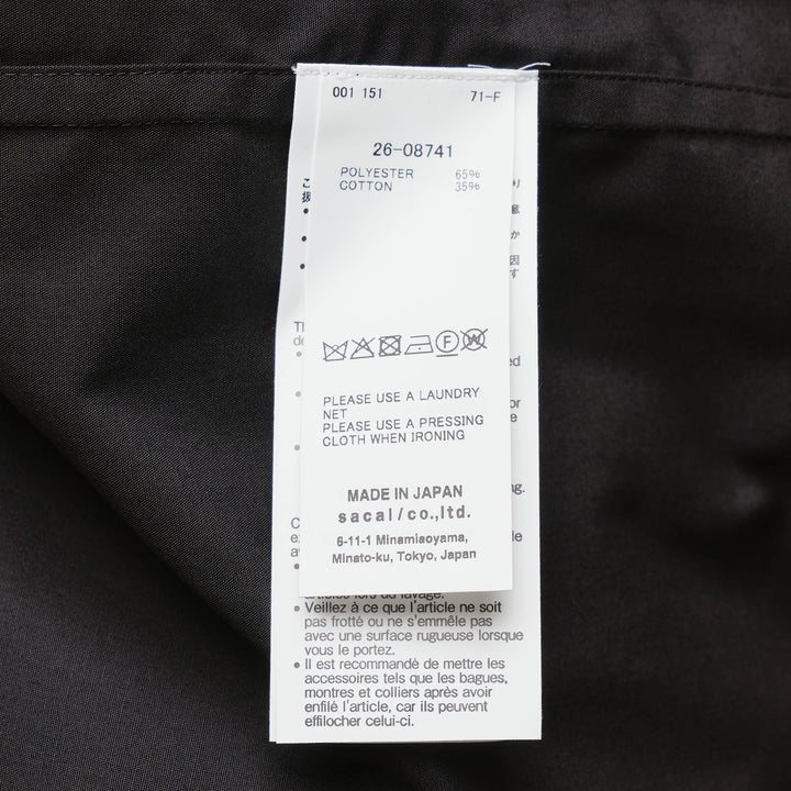 sacai black poplin long sleeve shirt with concealed front placket, point collar, chest pocket, and button-fastened cuffs, shown flat on white background - view 3