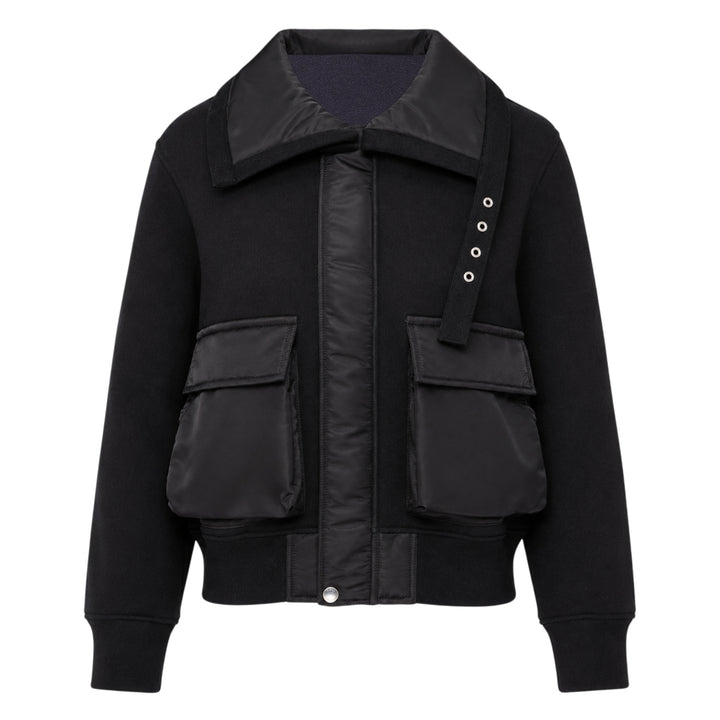 sacai Sponge Sweat Blouson in black, featuring a quilted nylon bib front, oversized spread collar, four cargo pockets, grommet strap detail, and ribbed cuffs