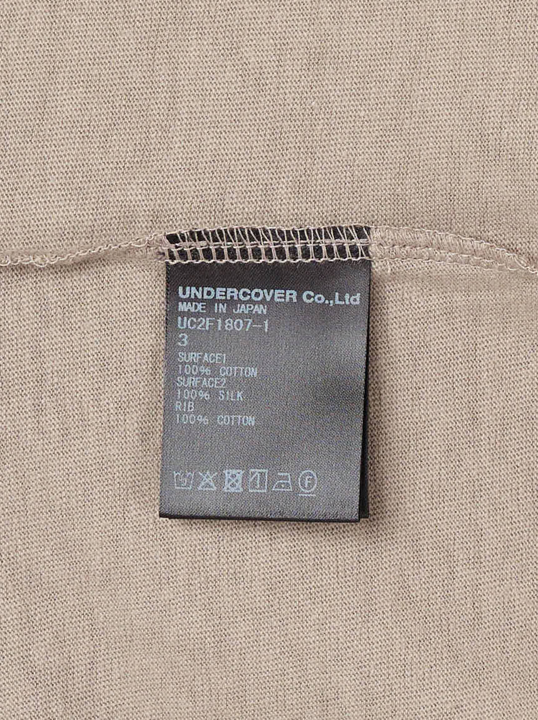 Undercover Shoulder Panel Tee in taupe with satin shoulder panels, chest pocket and knotted ribbon tie at the back neckline - view 3