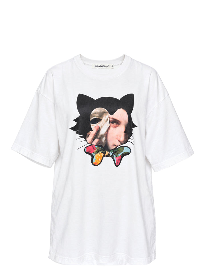 White oversized Undercover t-shirt with a black cat graphic featuring a classical portrait collage and a floral bow tie