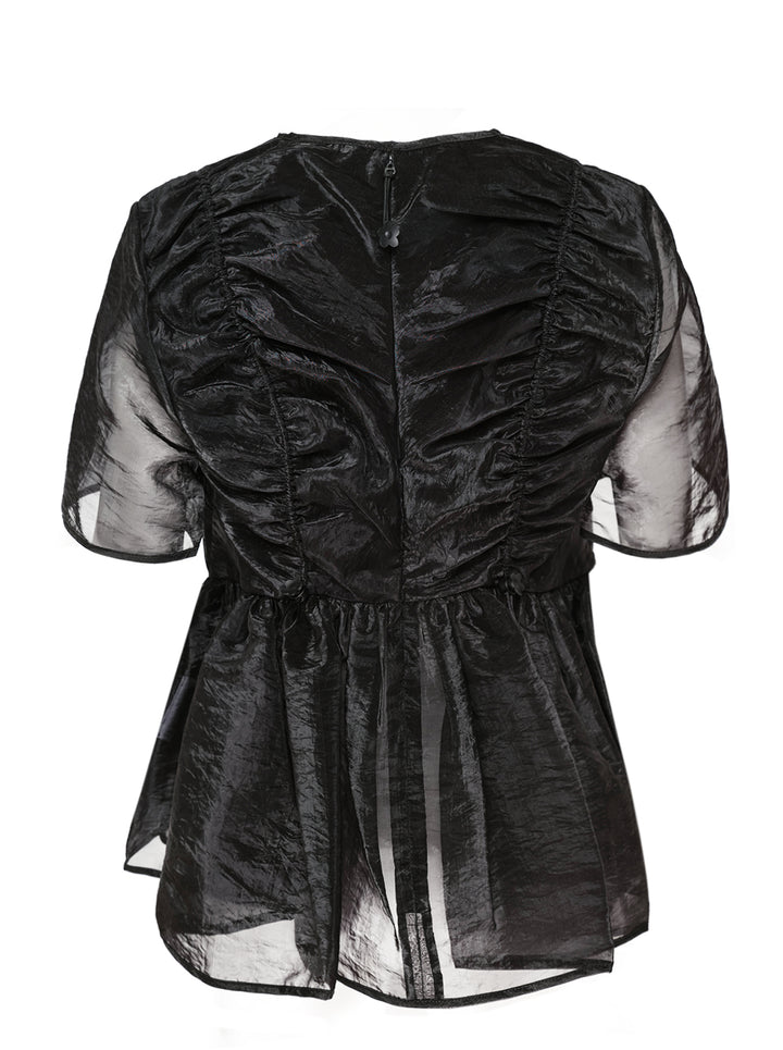 Cecilie Bahnsen Liquid Myrtia short-sleeve peplum top in black crinkled organza with sheer sleeves and gathered ruffle hem, photographed flat on a white background - view 2