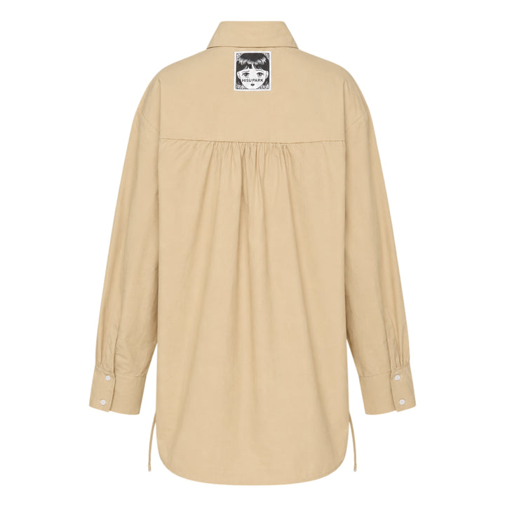 Hisu Park Savy Drawstring Shirt in beige cotton with sweeping black tulle ruffle appliqué wave detailing across the front and adjustable drawstring hem ties - view 2
