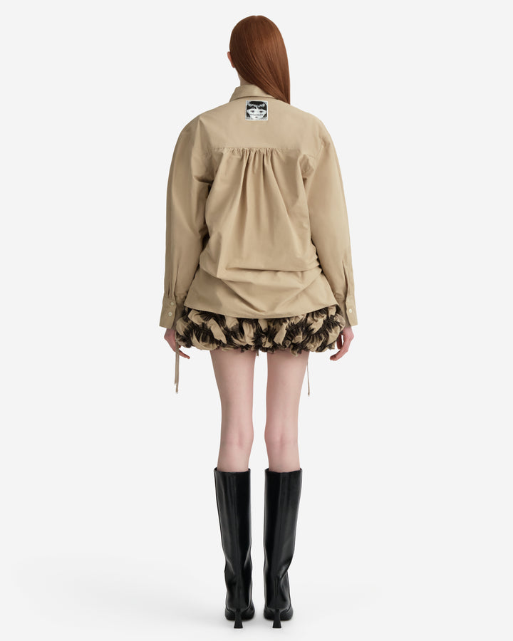 Hisu Park Savy Drawstring Shirt in beige cotton with sweeping black tulle ruffle appliqué wave detailing across the front and adjustable drawstring hem ties - view 6