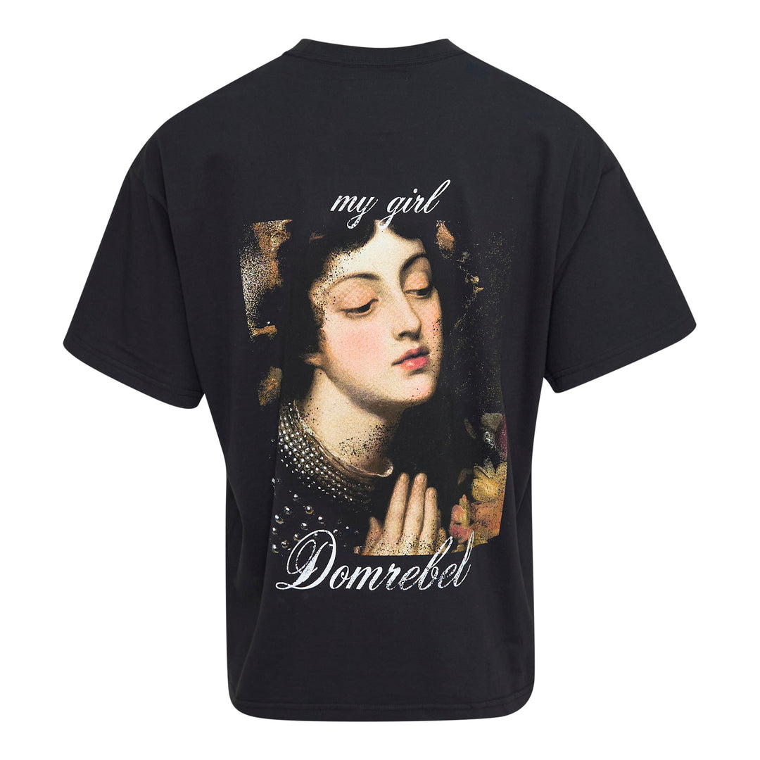Domrebel black oversized crew-neck tee featuring two Renaissance-style painted female portraits side by side, labelled 'good girl' and 'bad girl', with Domrebel script branding above