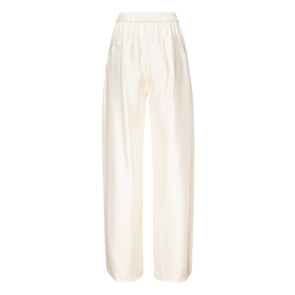 Alexander Wang Mid-Rise Track Pants in ivory with a wide balloon-leg silhouette, elasticated waistband, and tonal logo embroidery at the hip, shown flat against a white background - view 2