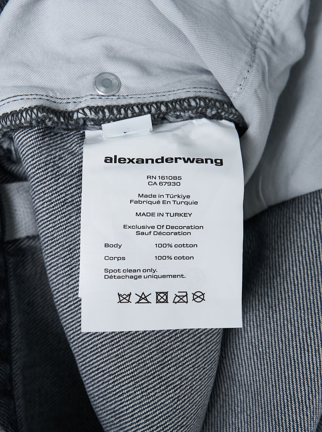 Alexander Wang unisex wide-leg jeans in washed charcoal denim with woven AW flasher label detail, front view - view 4