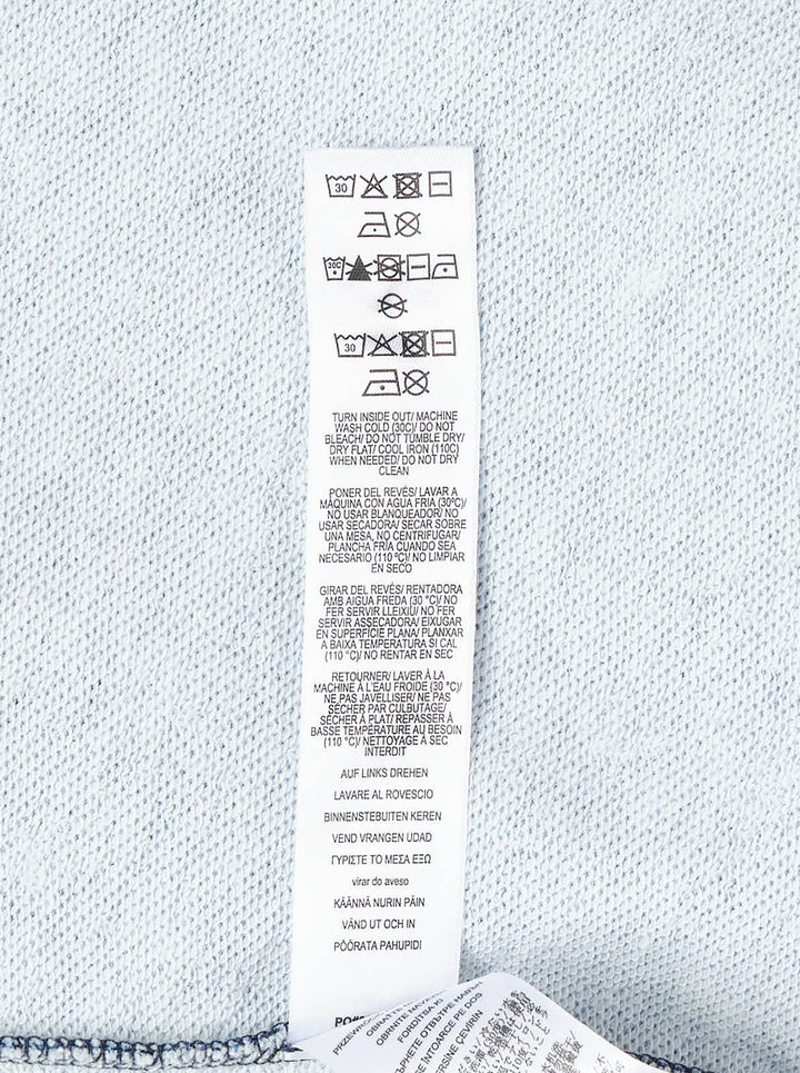 rag & bone Miramar Terry Bubble Skirt in light wash blue denim, featuring a front centre seam, bubble hem, and five-pocket construction - view 6
