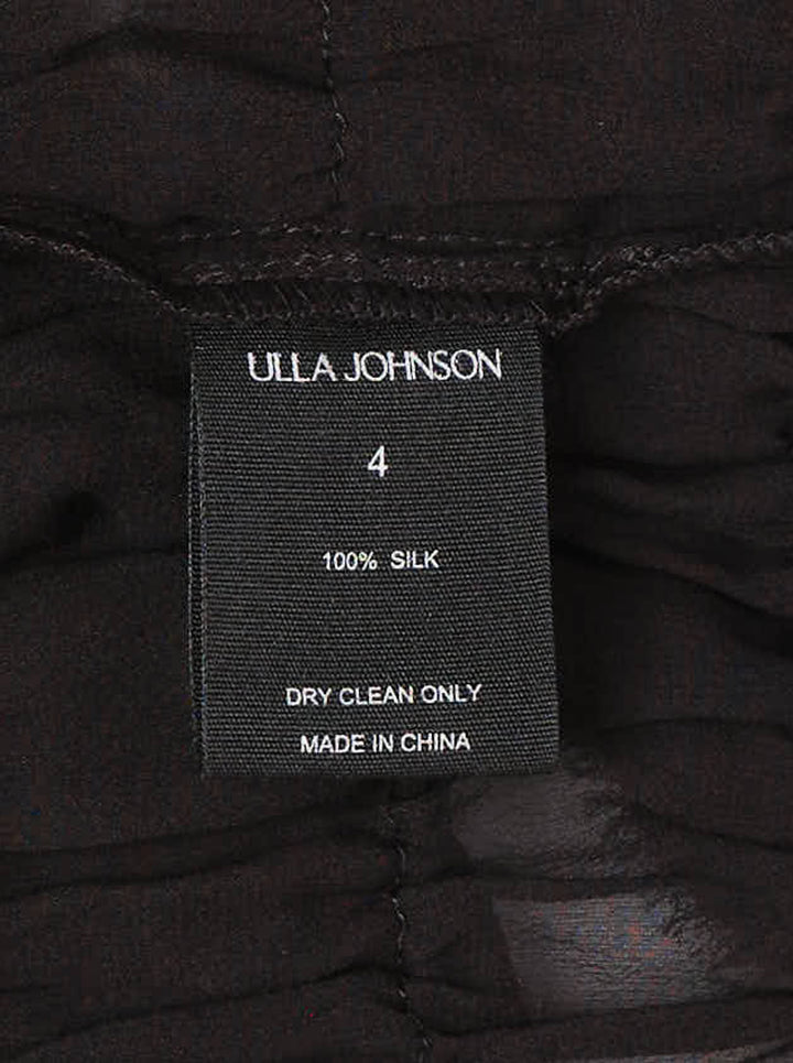 Ulla Johnson Mabel Short Sleeve Silk Top in black — sheer silk with cascading tiered ruffles, frayed collar trim, and puffed short sleeves - view 3