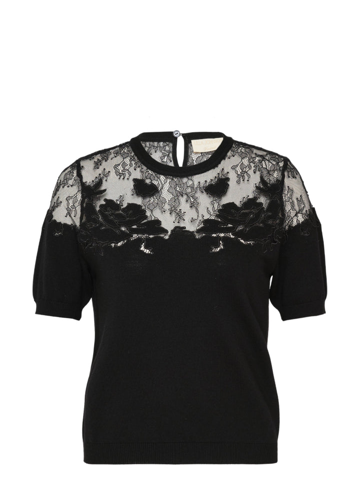 Ulla Johnson Ella Short Sleeve Lace Top in black, featuring a sheer floral embroidered lace yoke, puffed short sleeves, and a fine-knit body with keyhole back closure