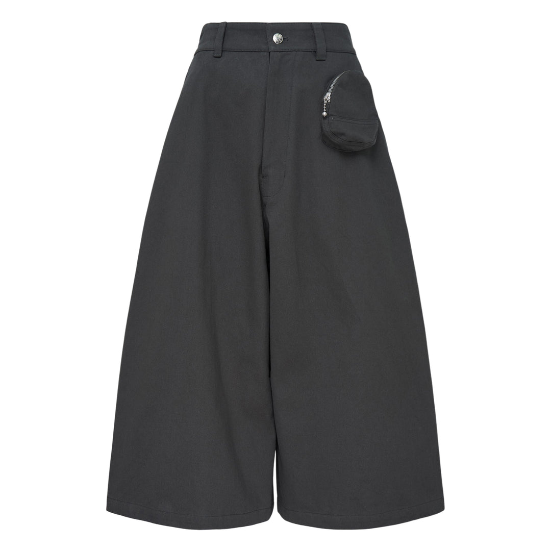 Melitta Baumeister charcoal wide-leg cargo culottes with high waist, sculptural rounded zip utility pocket, and A-line silhouette, shot flat on white background