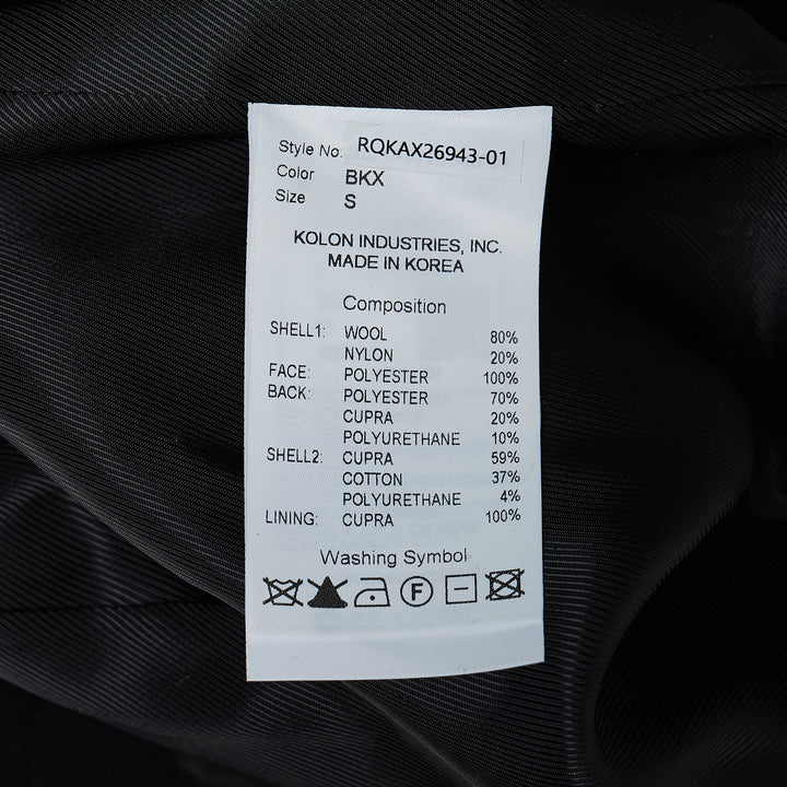 RE;CODE Slit H-Line Skirt in black, featuring a slim pencil silhouette, front slit with layered underlap, raw-fringed waistband, and woven brand label