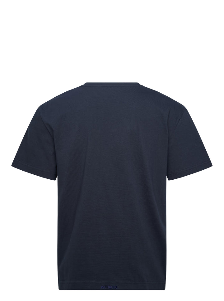 We11done Navy Glowstar T-Shirt with iridescent logo graphic and pink star motifs on a dark navy cotton base, front view - view 2