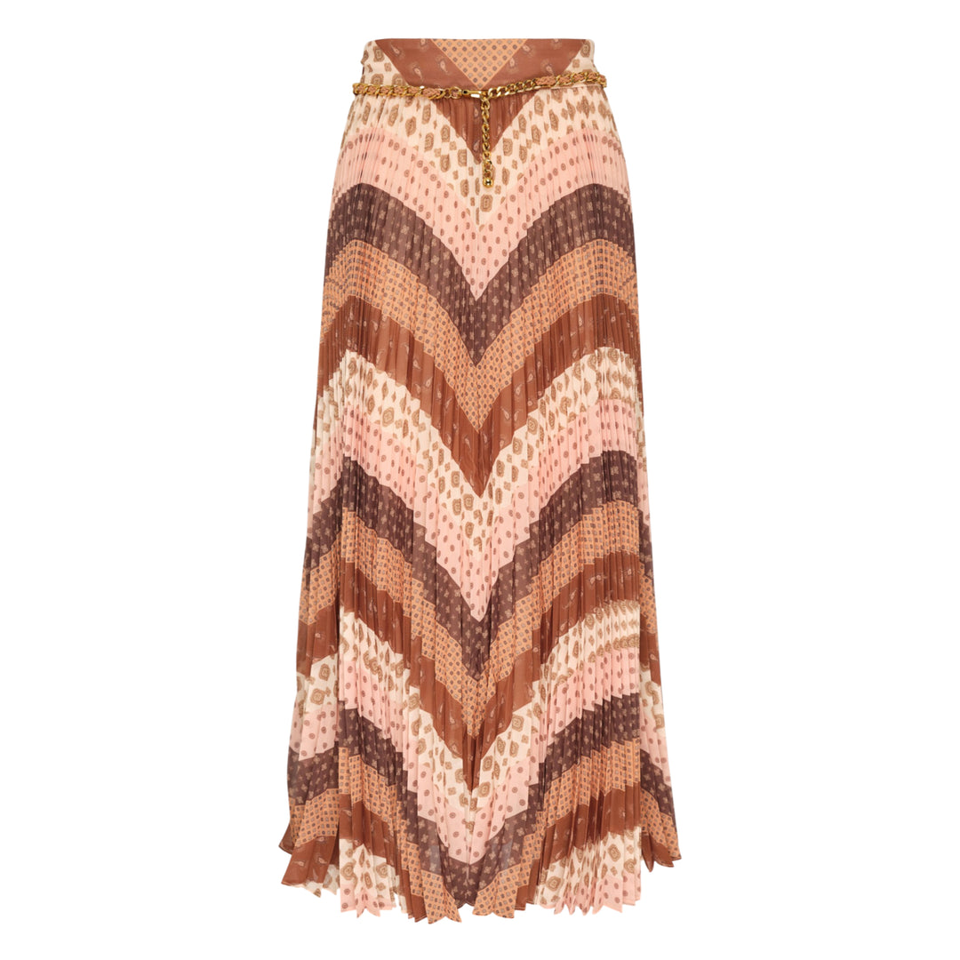 Zimmermann Sunray Pleated Maxi Skirt in warm-toned chevron mixed prints of leopard, paisley, and geometric patterns, with gold chain belt at the waist