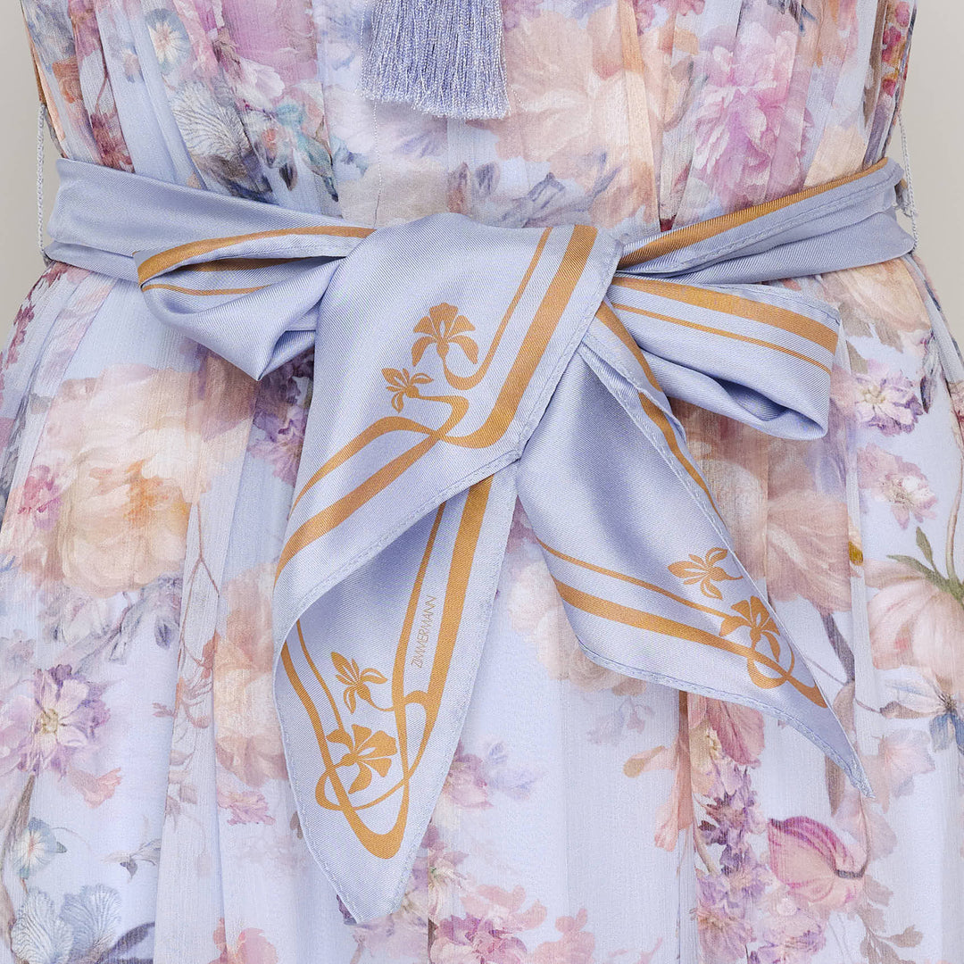 Zimmermann Valiant Flutter Midi Dress in pale blue with watercolour floral print, ruffled high neckline with tassel tie, flutter cap sleeves, printed sash belt, and tiered hem