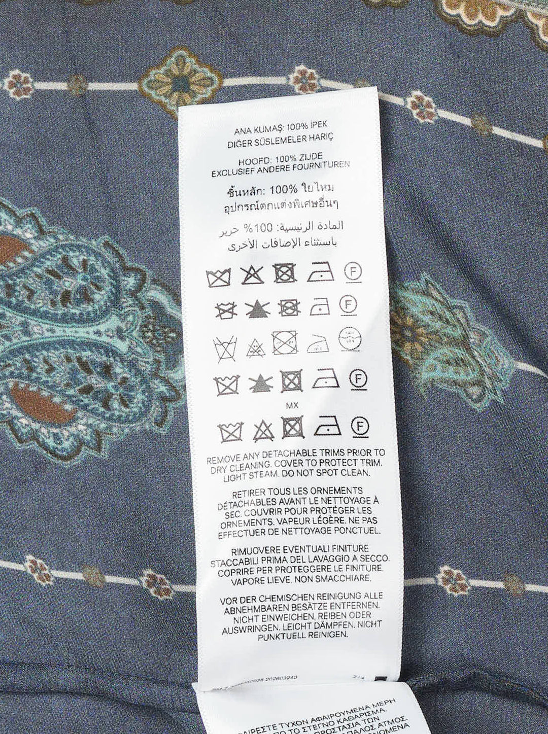 Zimmermann Satin Scarf Blouse in navy and bronze paisley print with self-tie bow collar, tassel ends, and button-through front placket - view 3