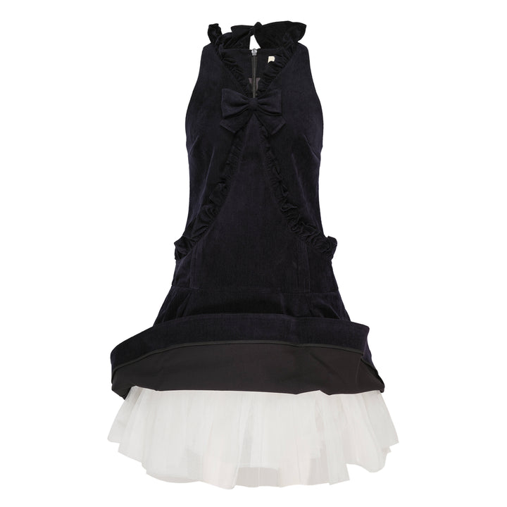 SHUSHU/TONG dark navy velvet halter mini dress with bow detail at chest, ruffled neckline and pocket trim, and drop-waist flared skirt — front view on white background
