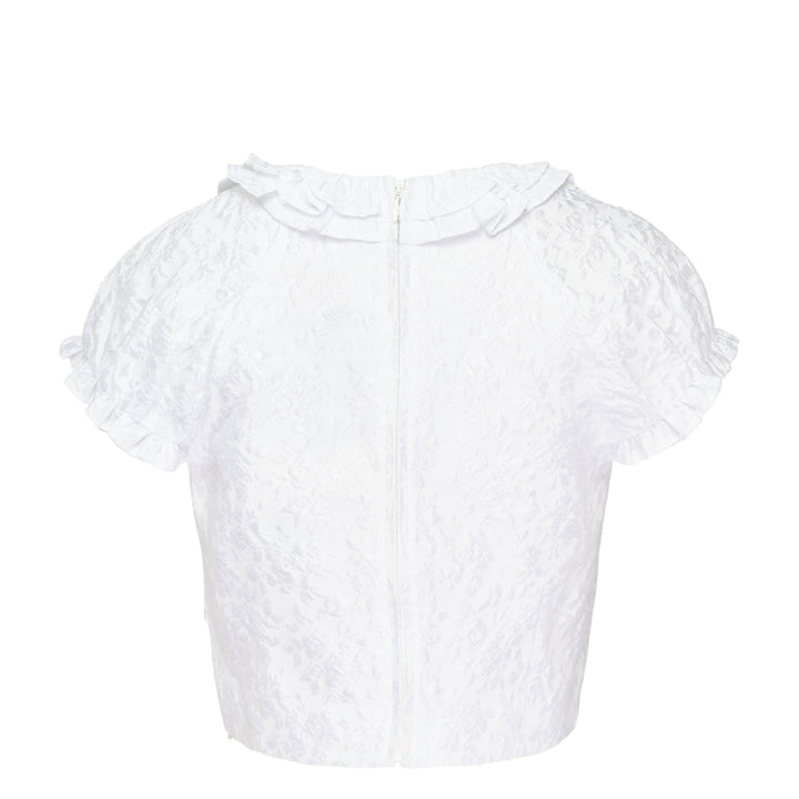 SHUSHU/TONG white jacquard ruffled bow crop top with puff sleeves, ruffle collar and hem trim, and structured satin bow at the centre front neckline, shown from the back