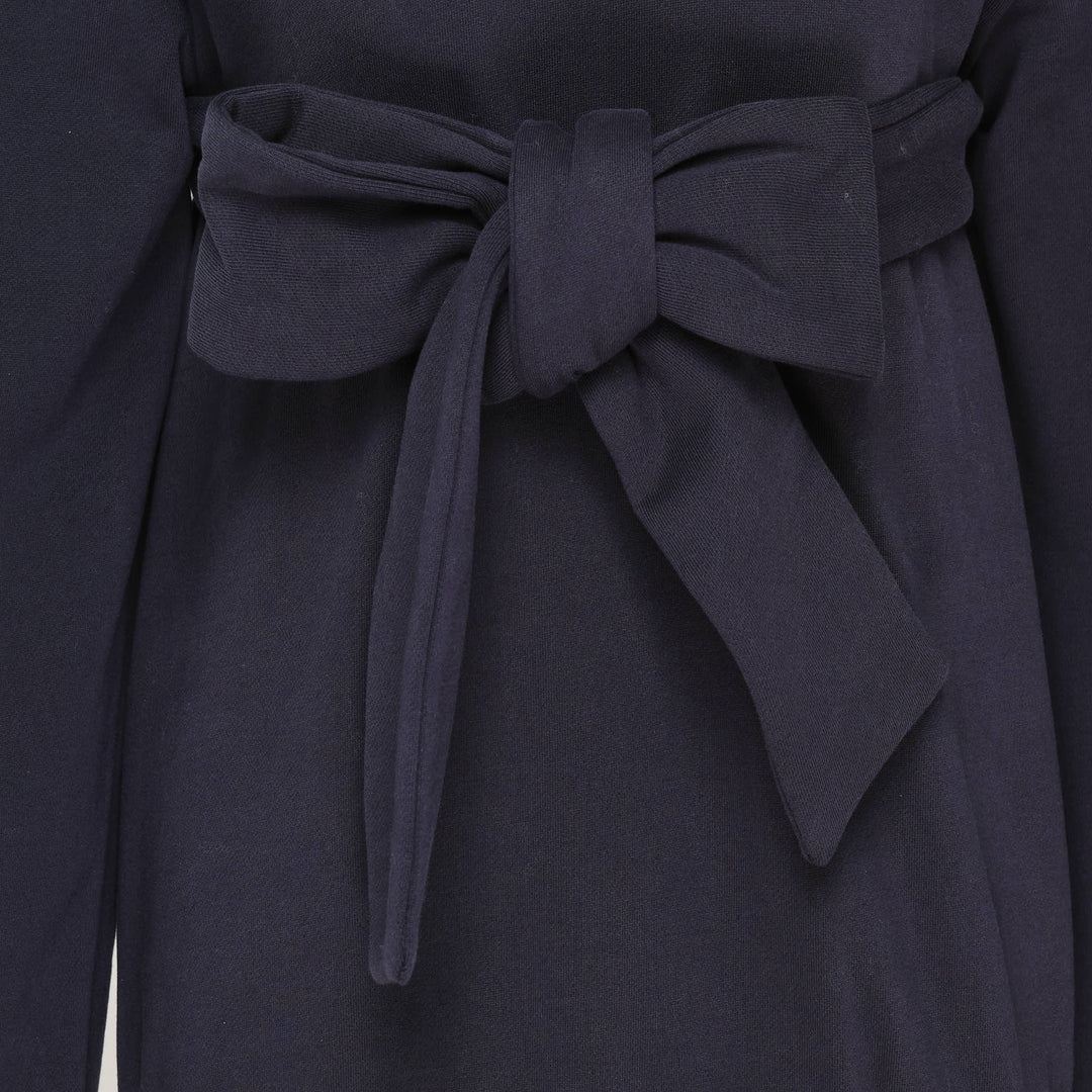 SHUSHU/TONG navy Tie Front Bow Hoodie with an oversized self-fabric bow at the waist, open V-neckline, and embroidered logo on the chest