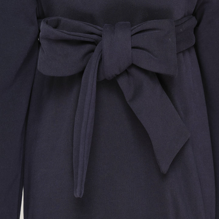 SHUSHU/TONG navy Tie Front Bow Hoodie with an oversized self-fabric bow at the waist, open V-neckline, and embroidered logo on the chest