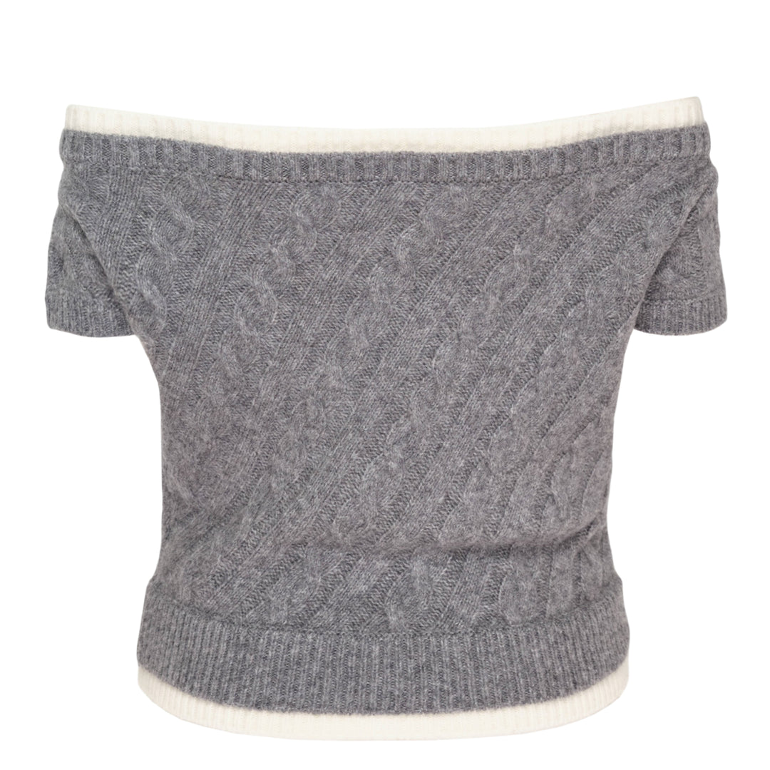 SHUSHU/TONG baby blue cable-knit off-shoulder crop top with cream contrast ribbed trim, bow accent at the neckline, and short sleeves, displayed flat on a white background