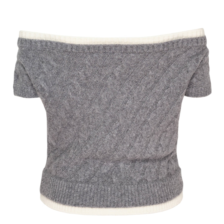 SHUSHU/TONG baby blue cable-knit off-shoulder crop top with cream contrast ribbed trim, bow accent at the neckline, and short sleeves, displayed flat on a white background
