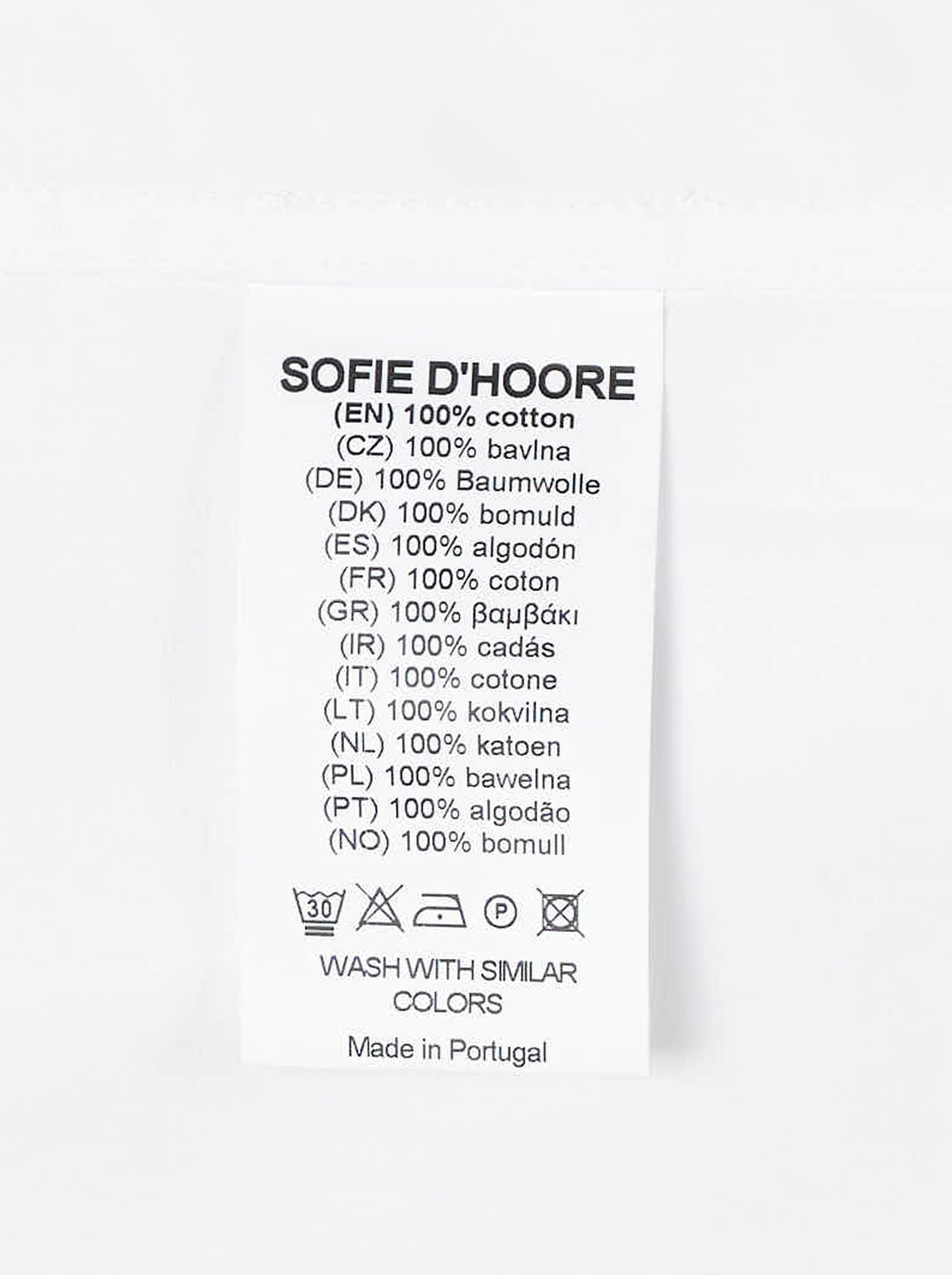 White long sleeve band collar shirt with curved bib front, buttoned half-placket and relaxed silhouette by Sofie D'Hoore - view 3