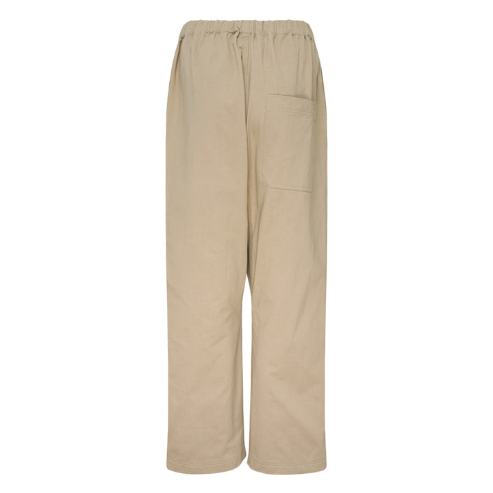 Sofie D'Hoore Elastic Low Crotch Pants in khaki, displayed flat — wide-leg silhouette with elasticated waistband and single button fastening