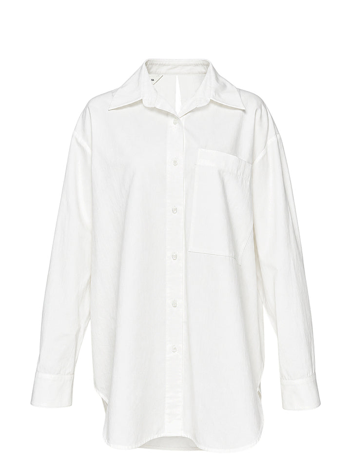 Musée RA white oversized shirt with pointed collar, button placket, chest pocket and open back tie detail, shown from the front