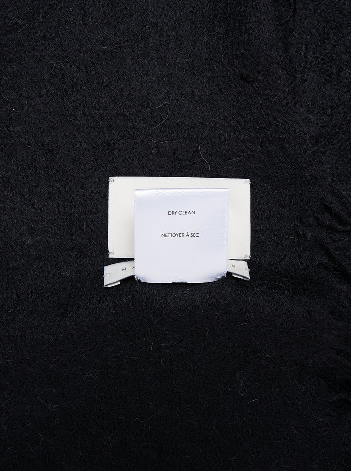 Black soft brushed rectangular scarf with feathered fringe edges, shown flat - view 3