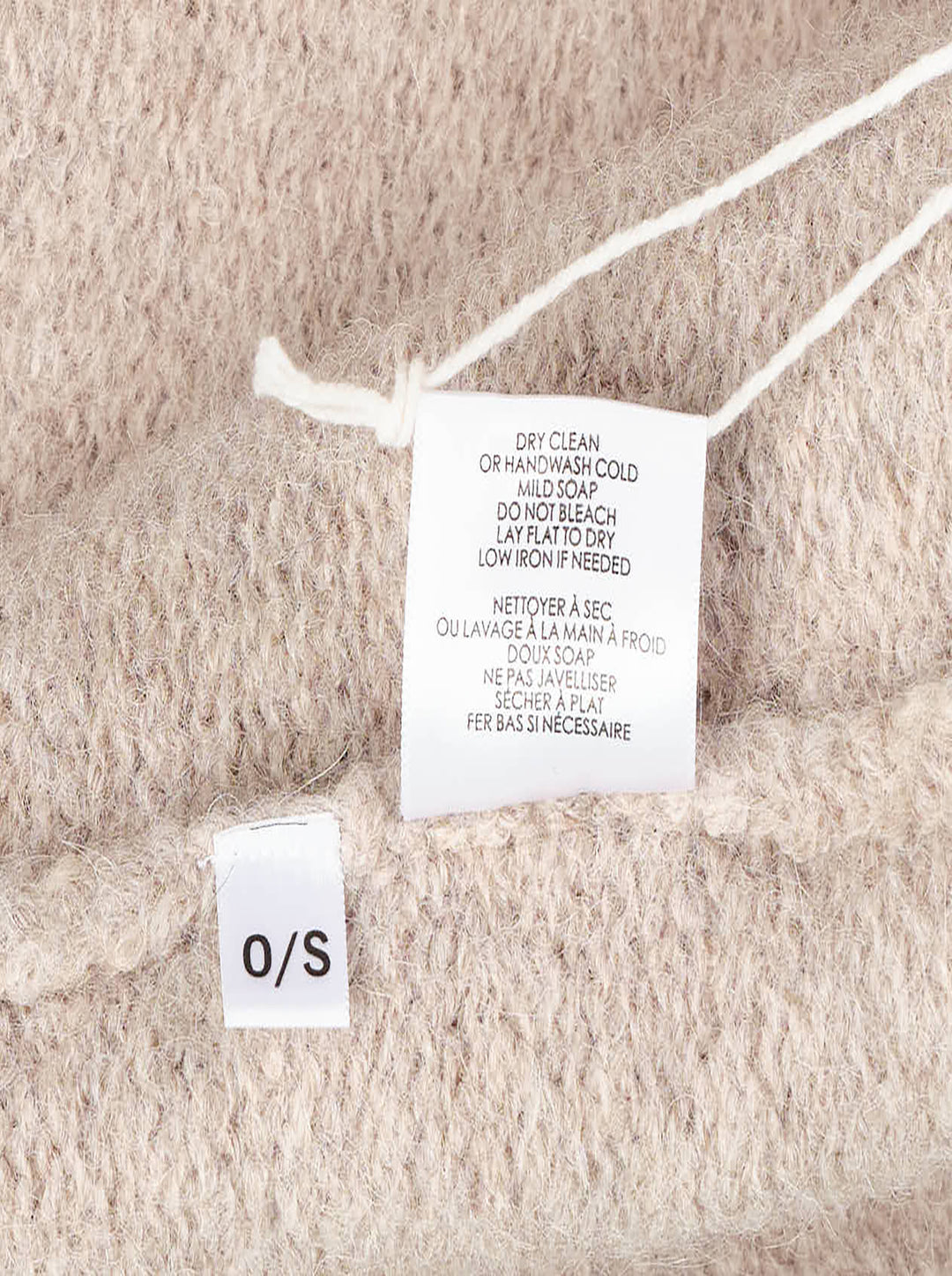 Lauren Manoogian Long Shawl Cardigan in heathered oatmeal, laid flat showing open-front silhouette, wide shawl collar, hip pockets, and woven brand label - view 4