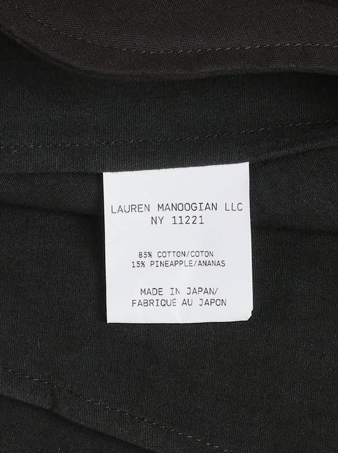 Black cap-sleeve wide-leg jumpsuit with pleated front and cinched waist by Lauren Manoogian - view 4
