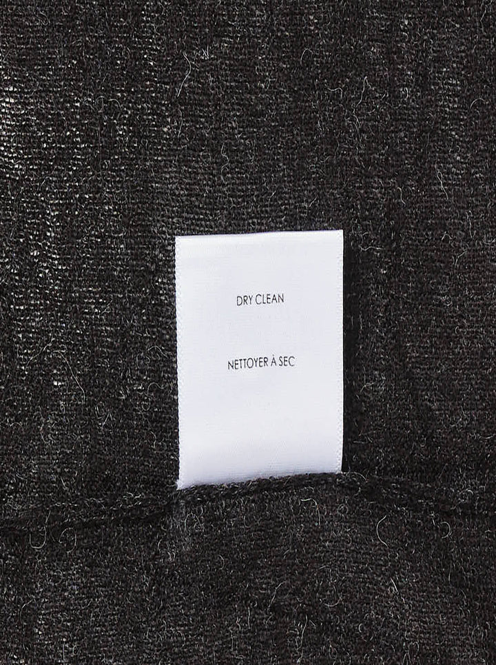 Lauren Manoogian Fine Low V-Neck Sweater in charcoal, featuring a deep V-neckline, oversized relaxed silhouette, dropped shoulders, and long sleeves, shown flat on a white background - view 4