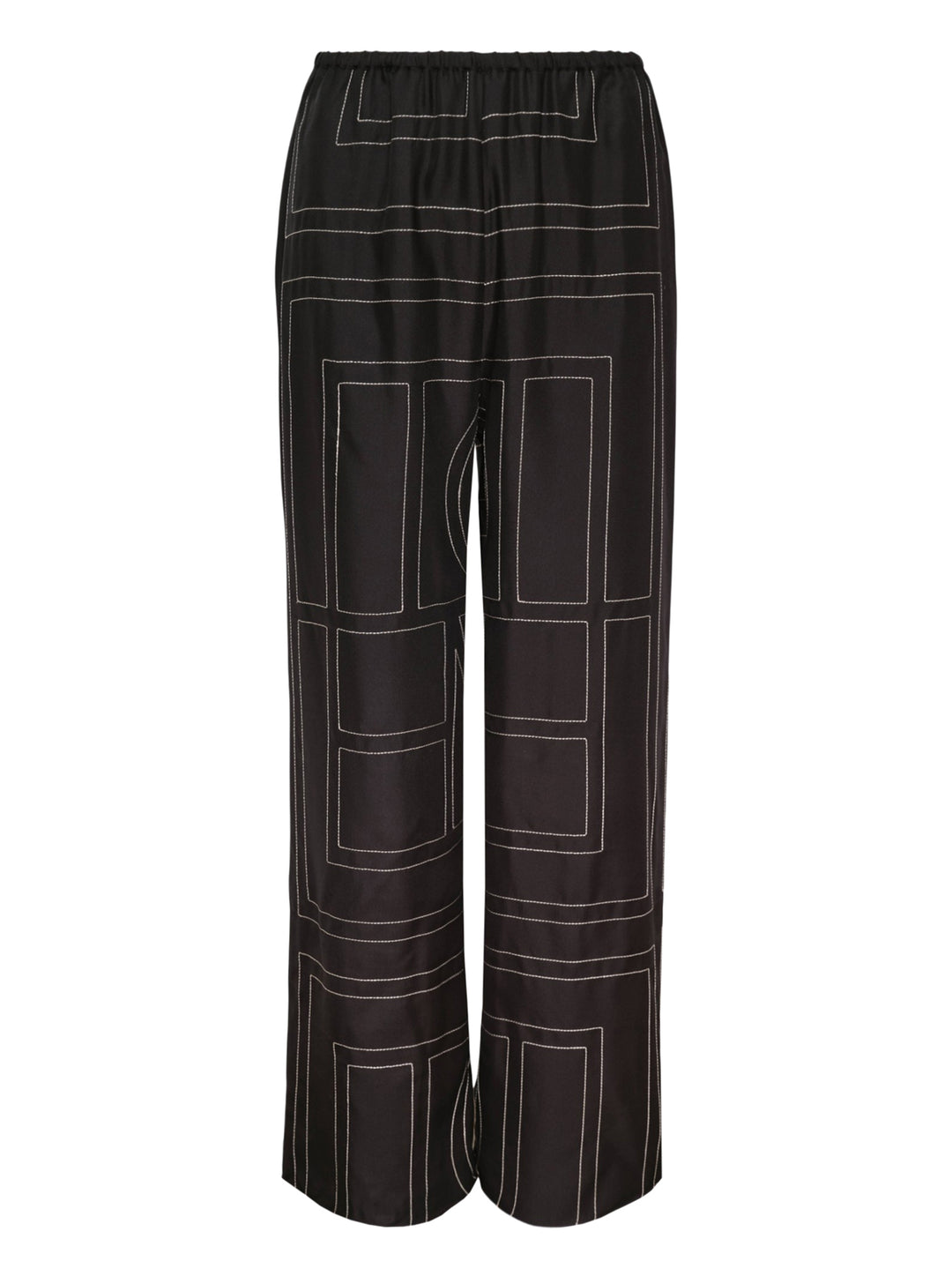 Toteme Monogram Silk Pyjama Pants in black with all-over contrast white stitched geometric panel print and elasticated waistband, wide-leg silhouette, flat lay view