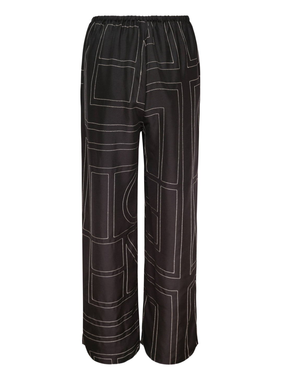 Toteme Monogram Silk Pyjama Pants in black with all-over contrast white stitched geometric panel print and elasticated waistband, wide-leg silhouette, flat lay view - view 2