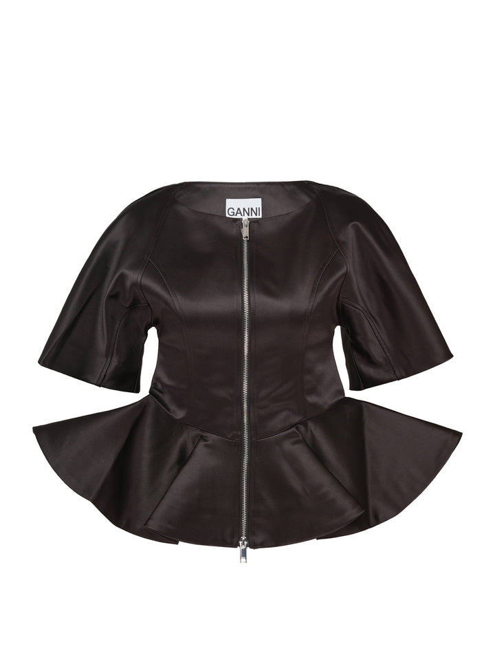 Ganni Duchesse Satin Peplum Zip Blouse in deep brown, displayed flat, featuring a full-length two-way zip, structured flared half-sleeves, and a dramatic fluted peplum hem