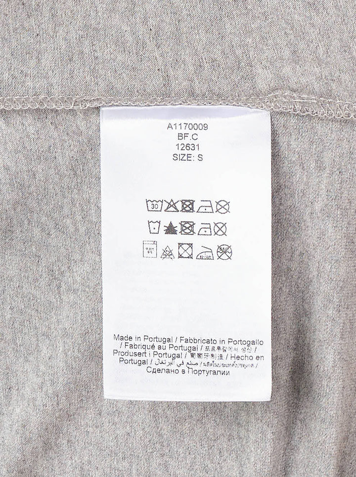Ganni Heavy Stretch Cotton Draped Top in grey marl with long sleeves, crew neck, and asymmetric ruched waist detail - view 3