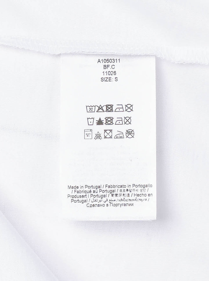 Ganni white relaxed cotton t-shirt with collegiate 'Ganni' lettering above a distressed graphic of two fuzzy bears wearing mushroom caps, with 'Have a nice day! Please recycle' text beneath - view 3
